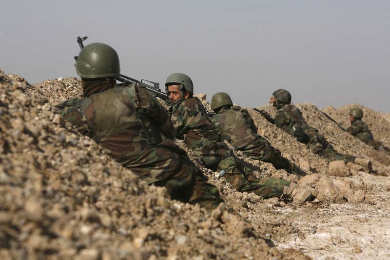 Marines with 1/3 Charlie Company fire a mortar near Marjah; photo - Patrick Baz, AFP via Getty