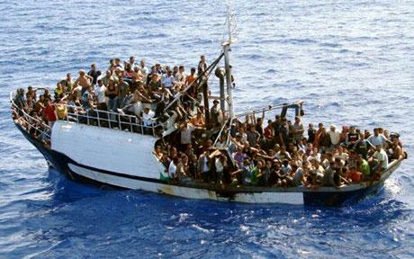 Immigrants travelling by boat to Italy - but most illegal immigrants in Italy are overstayers